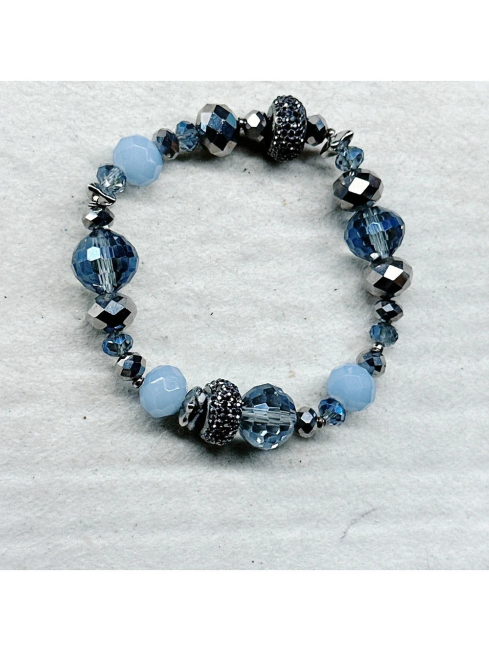 4654gc. Blue and Silvertone Glass Stretch Bracelet